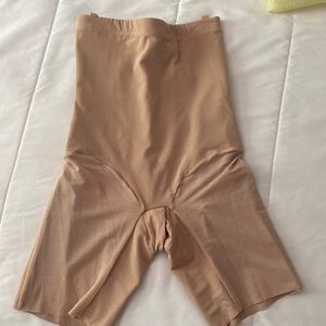 Honey love super power short.  NEVER WORN
